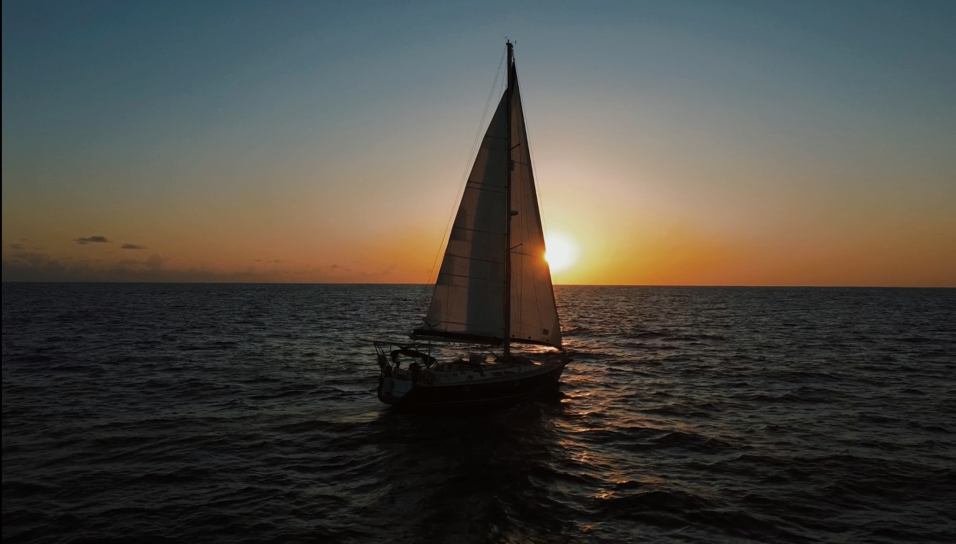 Velero Forquilla sailing at sunset during the Atlantic crossing